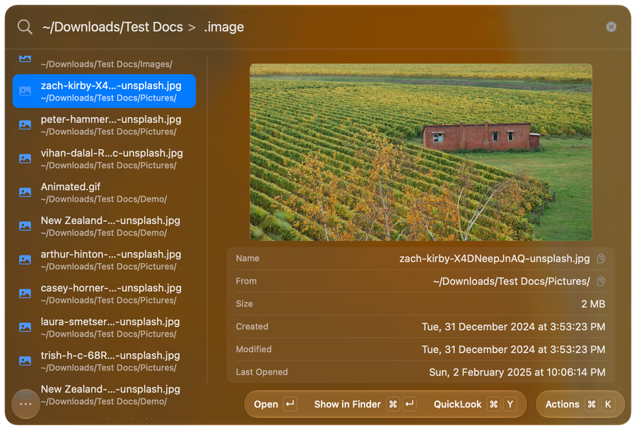 Screenshot showing FileMinutes searching image files in a folder with a live preview and file details